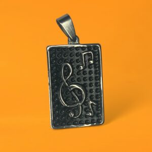 Dije Clave de Sol Fondo negro + Cadena - Acero Quir